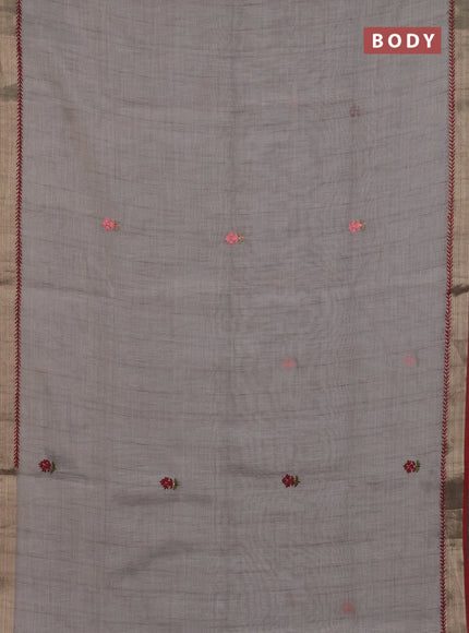 Linen cotton saree grey shade and maroon with embroidery buttas and zari woven border