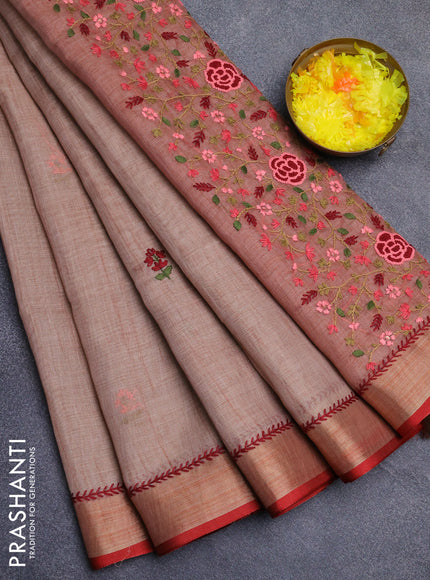 Linen cotton saree red shade and red with embroidery buttas and zari woven border