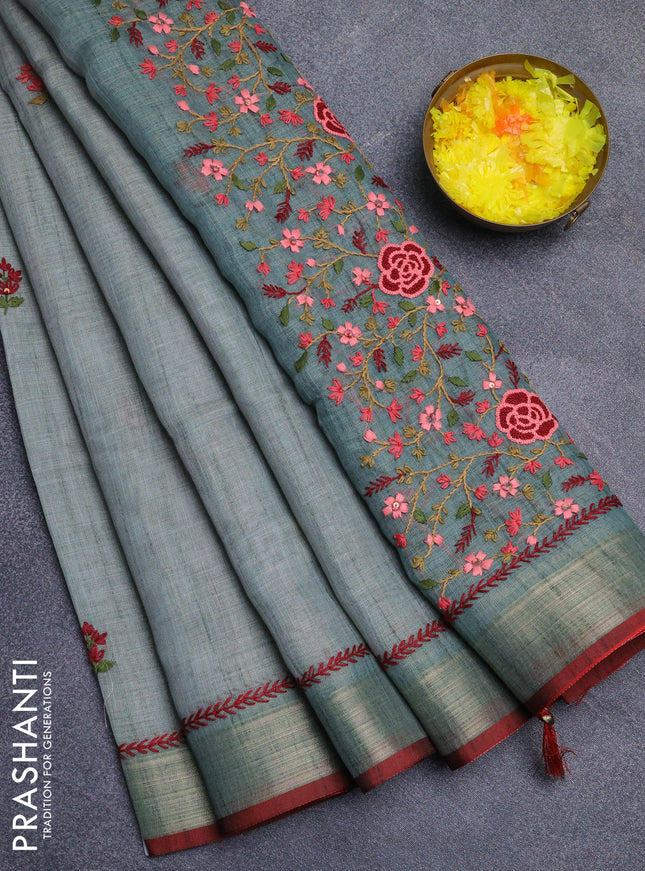 Linen cotton saree pastel blue and maroon with embroidery buttas and zari woven border
