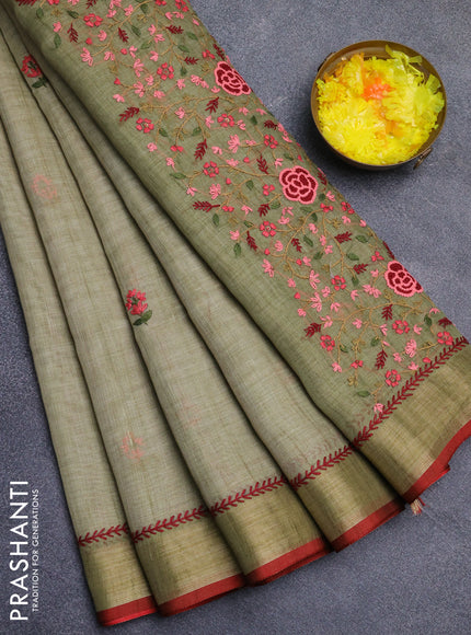 Linen cotton saree light green and red with embroidery buttas and zari woven border
