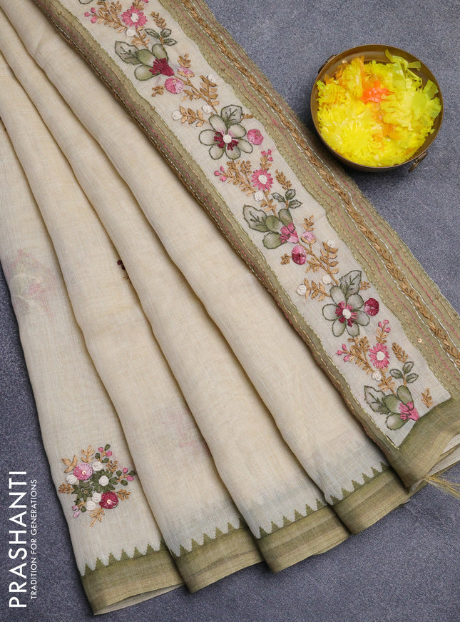 Linen cotton saree beige and olive green with embroidery buttas and simple border