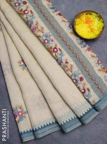 Linen cotton saree beige and pastel blue with embroidery buttas and simple border