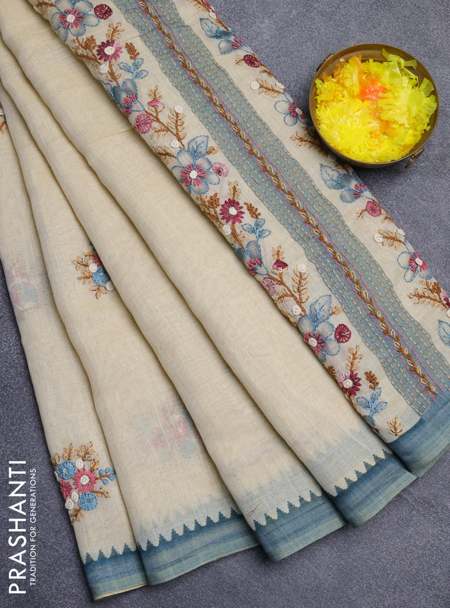Linen cotton saree beige and pastel blue with embroidery buttas and simple border