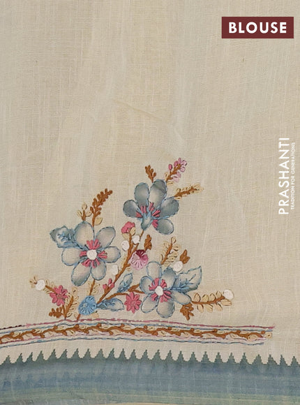 Linen cotton saree beige and pastel blue with embroidery buttas and simple border