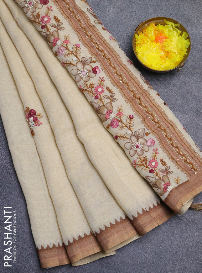 Linen cotton saree beige and sandal with embroidery buttas and simple border