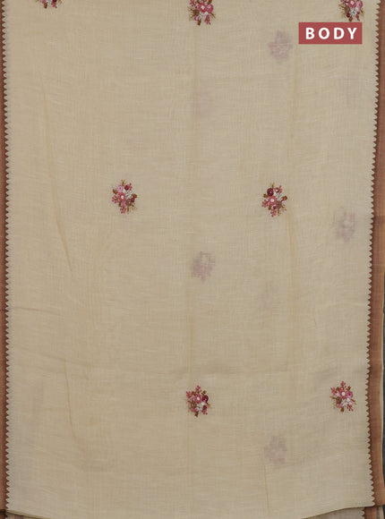 Linen cotton saree beige and sandal with embroidery buttas and simple border