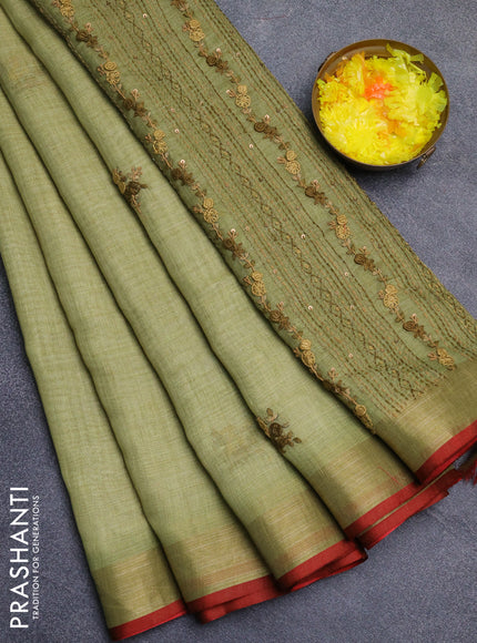 Linen cotton saree light green and maroon with embroidery buttas and zari woven border