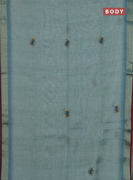 Linen cotton saree pastel blue and maroon with embroidery buttas and zari woven border