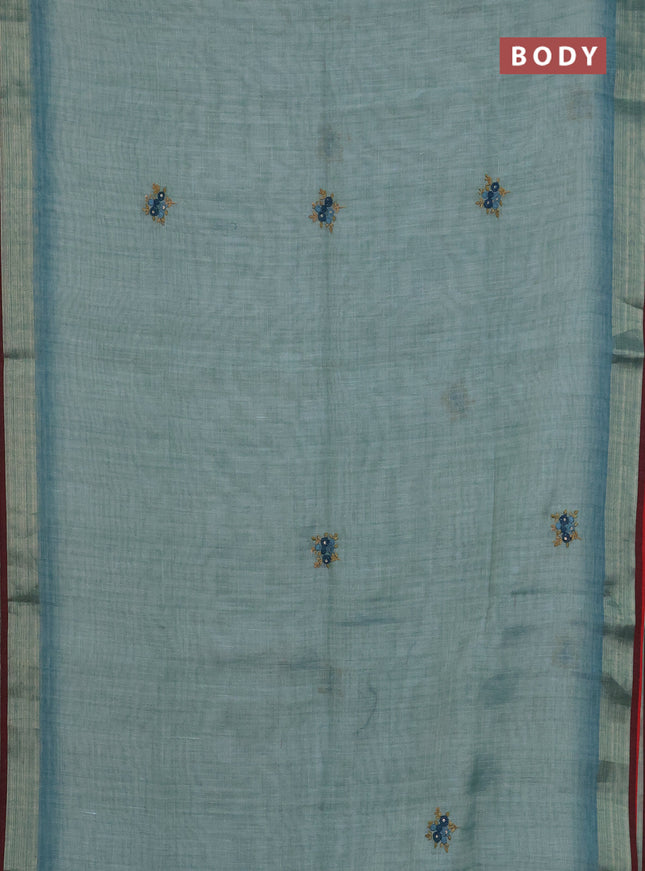 Linen cotton saree pastel blue and maroon with embroidery buttas and zari woven border
