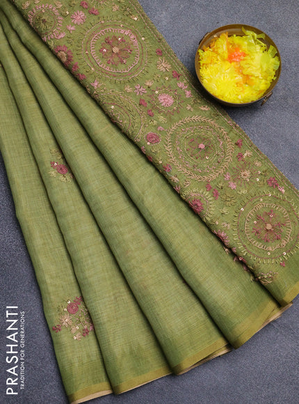 Linen cotton saree light green with embroidery buttas and simple border