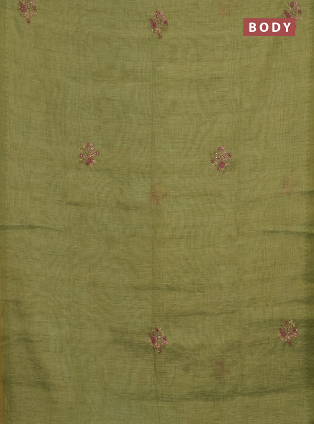 Linen cotton saree light green with embroidery buttas and simple border