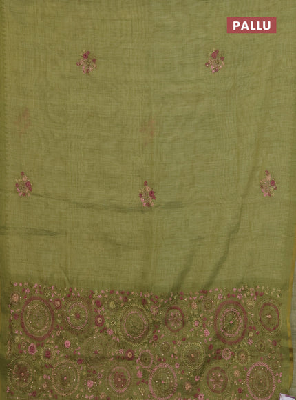 Linen cotton saree light green with embroidery buttas and simple border