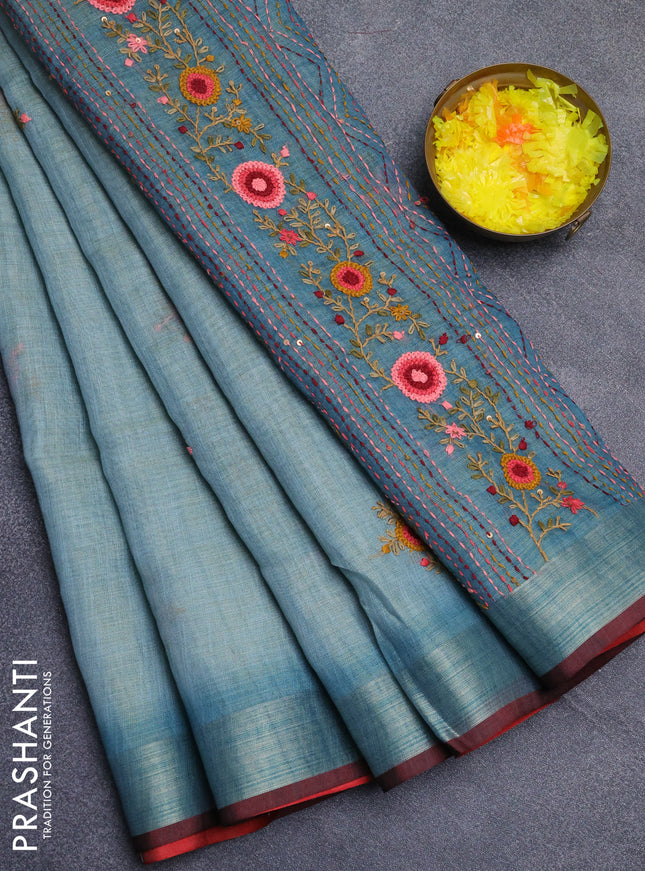 Linen cotton saree pastel blue and maroon with embroidery buttas and zari woven border