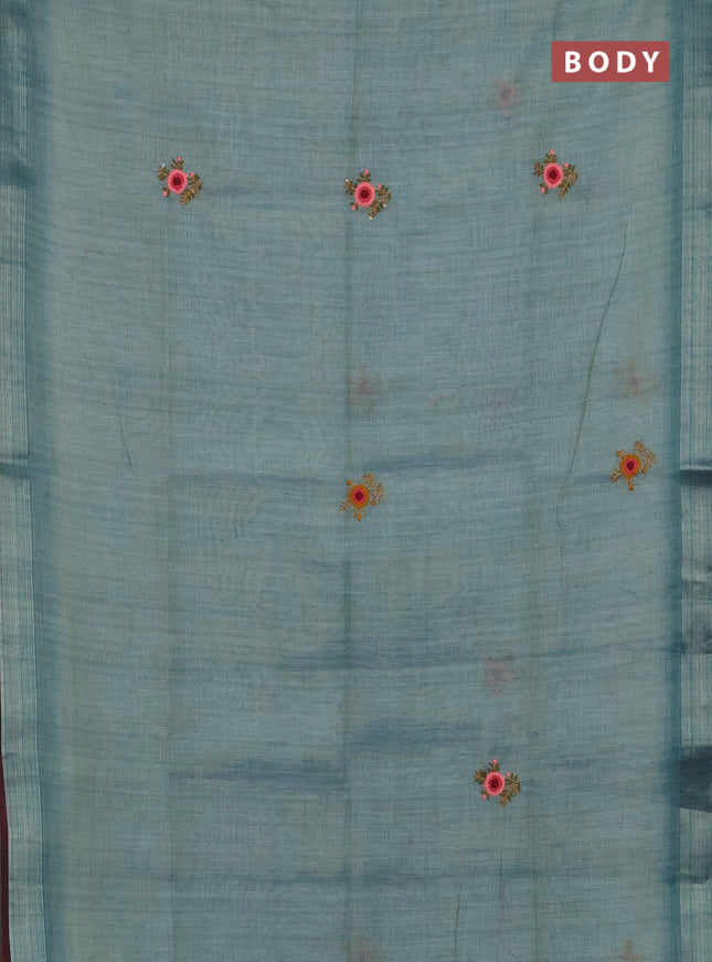 Linen cotton saree pastel blue and maroon with embroidery buttas and zari woven border