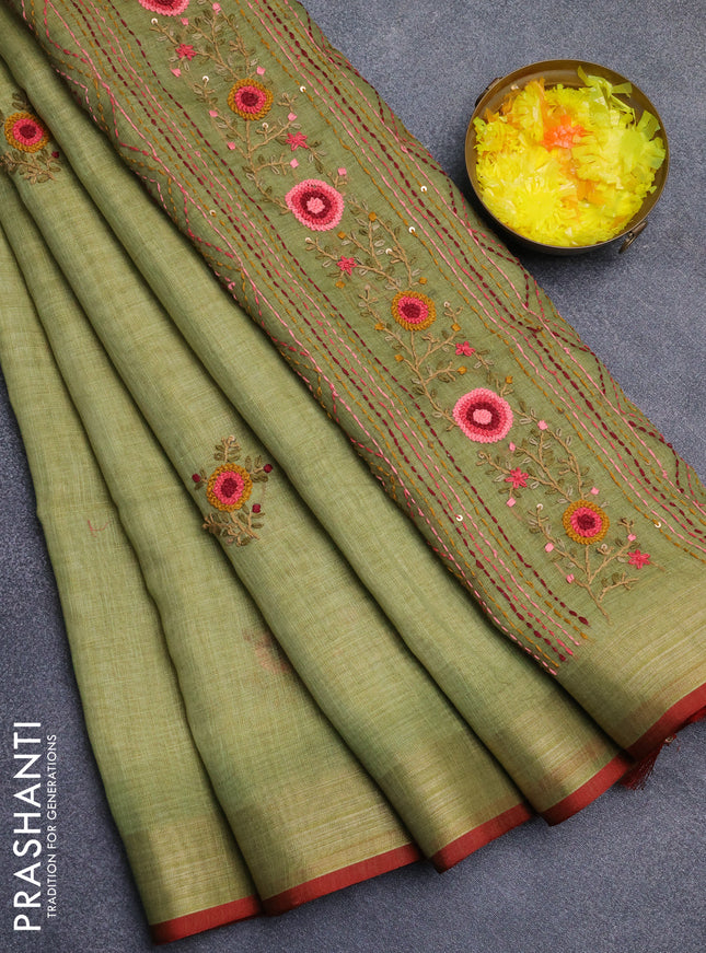 Linen cotton saree light green and maroon with embroidery buttas and zari woven border