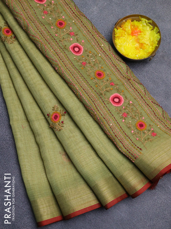 Linen cotton saree light green and maroon with embroidery buttas and zari woven border
