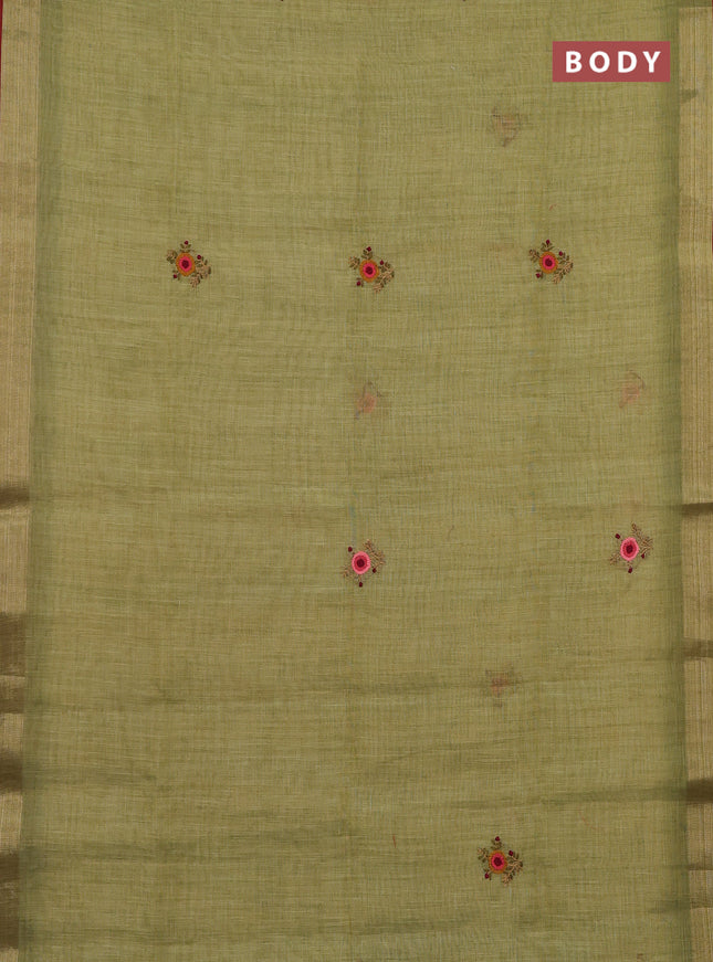 Linen cotton saree light green and maroon with embroidery buttas and zari woven border
