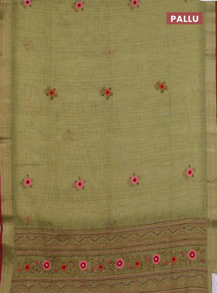 Linen cotton saree light green and maroon with embroidery buttas and zari woven border
