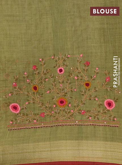 Linen cotton saree light green and maroon with embroidery buttas and zari woven border