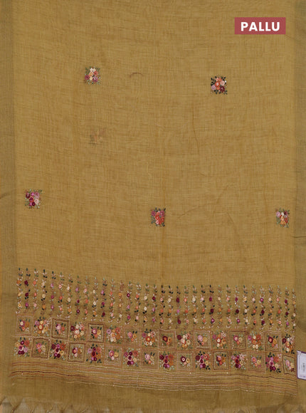 Linen cotton saree mustard yellow with embroidery buttas and printed border