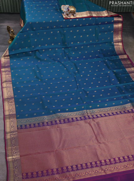 Kanchipuram silk saree peacock blue and wine shade with allover zari woven buttas and zari woven border