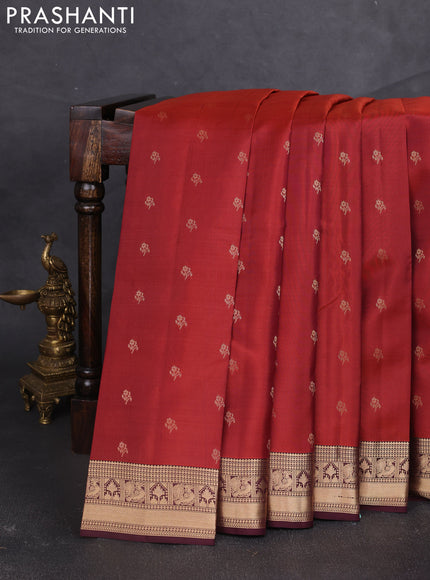 Kanchipuram silk saree rustic orange and wine shade with allover zari woven buttas and zari woven border