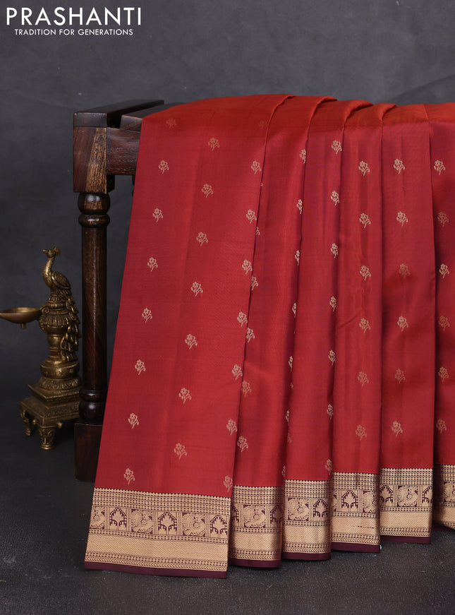 Kanchipuram silk saree rustic orange and wine shade with allover zari woven buttas and zari woven border