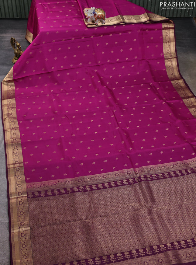 Kanchipuram silk saree magenta pink and wine shade with allover zari woven buttas and zari woven border