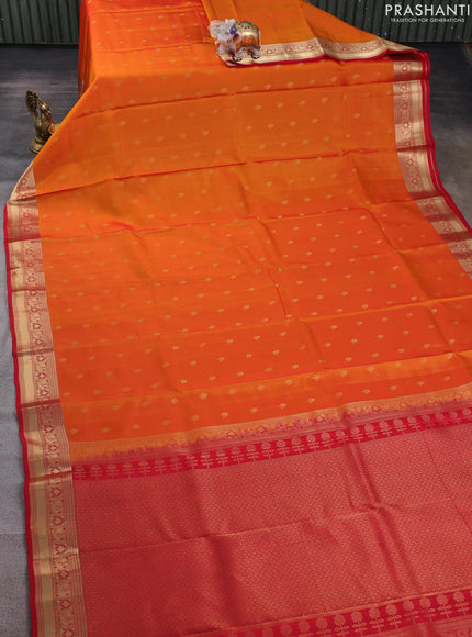 Kanchipuram silk saree orange and red with allover zari woven buttas and zari woven border