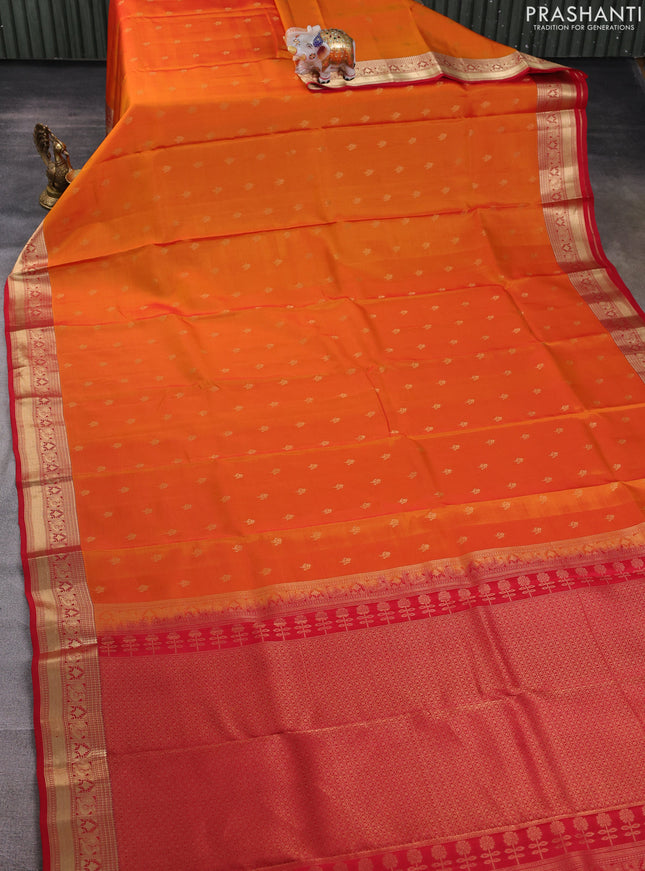Kanchipuram silk saree orange and red with allover zari woven buttas and zari woven border