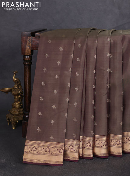Kanchipuram silk saree oliver green shade and deep wine shade with allover zari woven buttas and zari woven border
