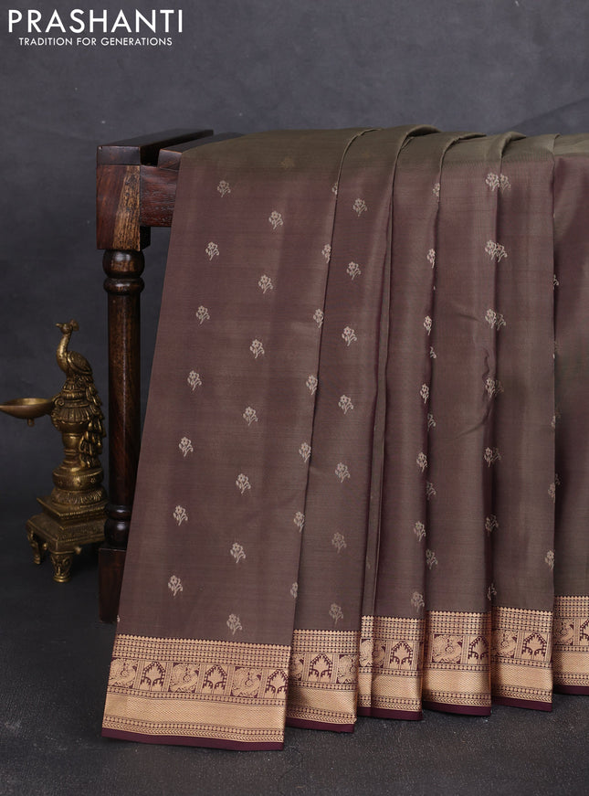 Kanchipuram silk saree oliver green shade and deep wine shade with allover zari woven buttas and zari woven border