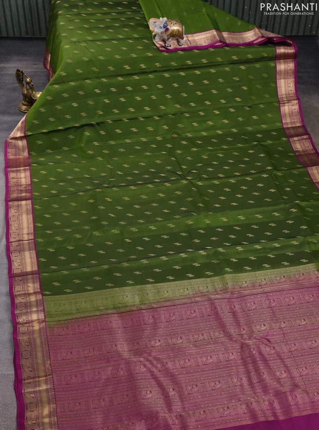 Kanchipuram silk saree sap green and magenta pink with allover zari woven buttas and zari woven border