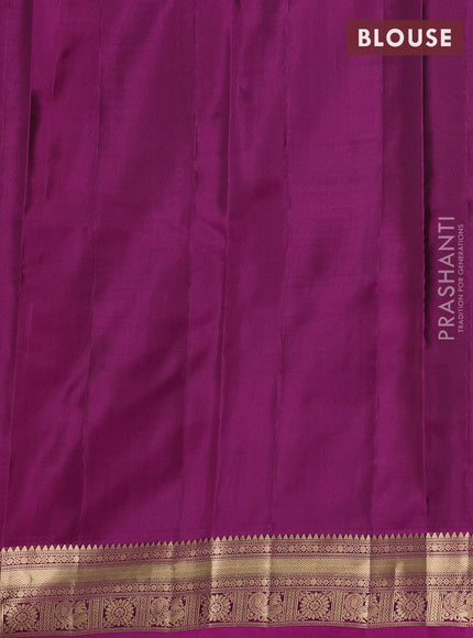 Kanchipuram silk saree sap green and magenta pink with allover zari woven buttas and zari woven border