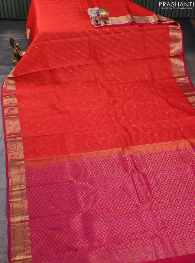 Kanchipuram silk saree orange and pink with allover zari weaves & buttas and zari woven border