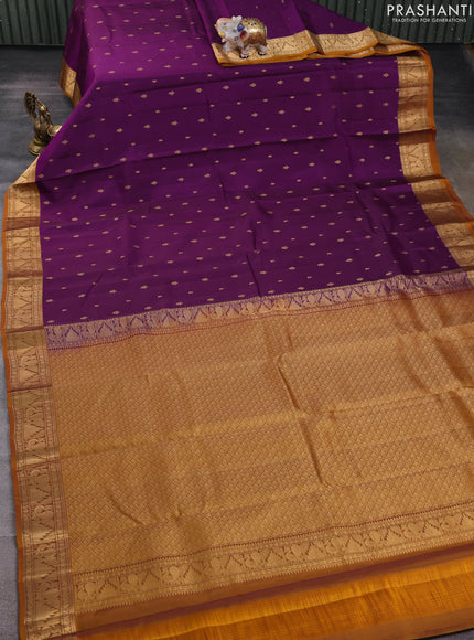Kanchipuram silk saree purple shade and dark mustard with allover zari woven buttas and annam & temple zari woven border