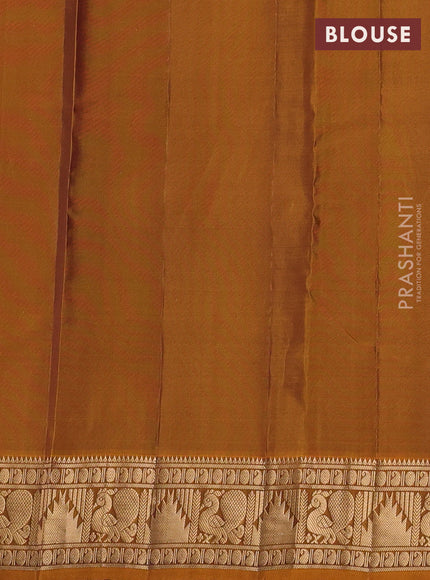 Kanchipuram silk saree purple shade and dark mustard with allover zari woven buttas and annam & temple zari woven border