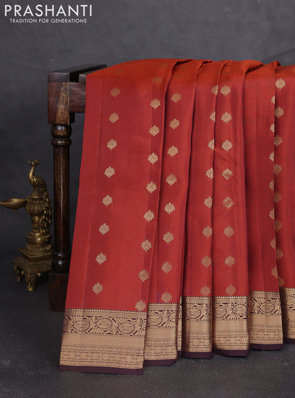 Kanchipuram silk saree rustic orange and coffee brown with allover zari woven buttas and zari woven border