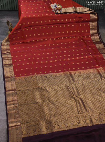 Kanchipuram silk saree rustic orange and coffee brown with allover zari woven buttas and zari woven border