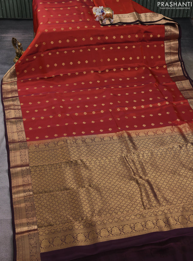 Kanchipuram silk saree rustic orange and coffee brown with allover zari woven buttas and zari woven border
