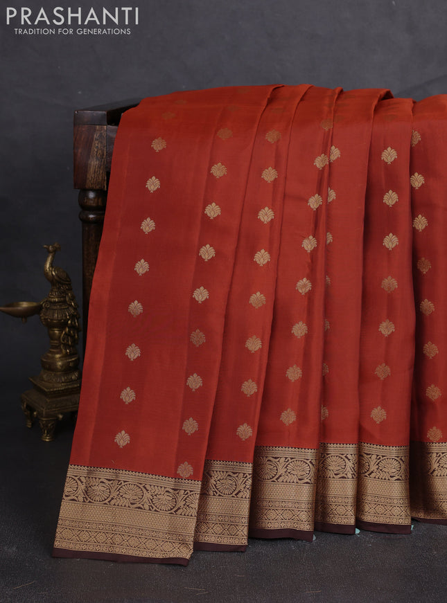 Kanchipuram silk saree rustic orange and coffee brown with allover zari woven buttas and zari woven border