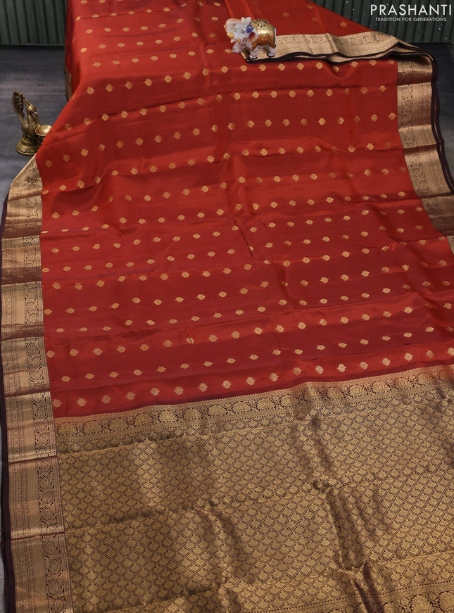 Kanchipuram silk saree rustic orange and coffee brown with allover zari woven buttas and zari woven border