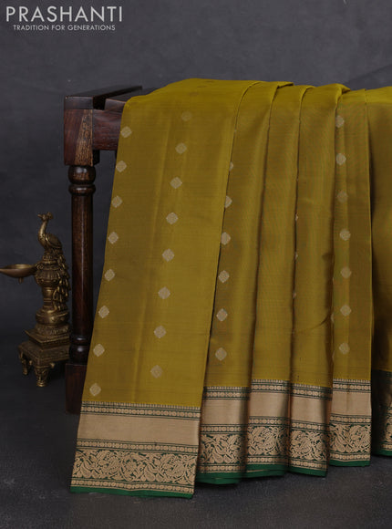 Kanchipuram silk saree mehendi green and green with allover zari woven buttas and rich zari woven border