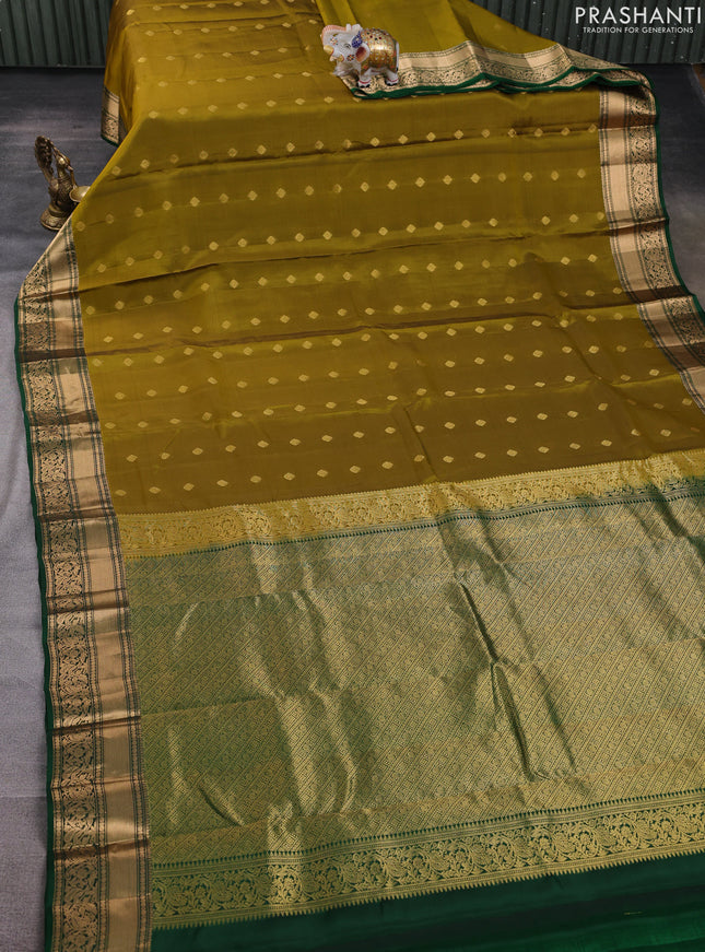 Kanchipuram silk saree mehendi green and green with allover zari woven buttas and rich zari woven border