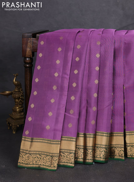 Kanchipuram silk saree purple shade and green with allover zari woven buttas and rich zari woven border