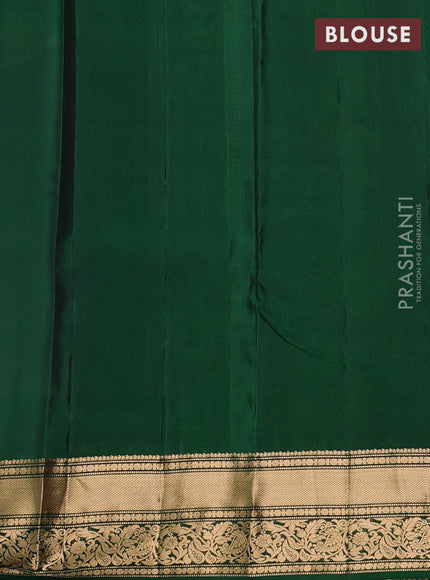 Kanchipuram silk saree purple shade and green with allover zari woven buttas and rich zari woven border