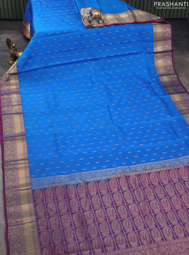 Kanchipuram silk saree cs blue and dual shade of red with allover zari woven buttas and rich zari woven border