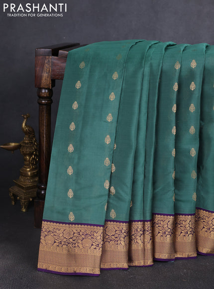Kanchipuram silk saree pastel green and violet with allover zari woven buttas and zari woven border