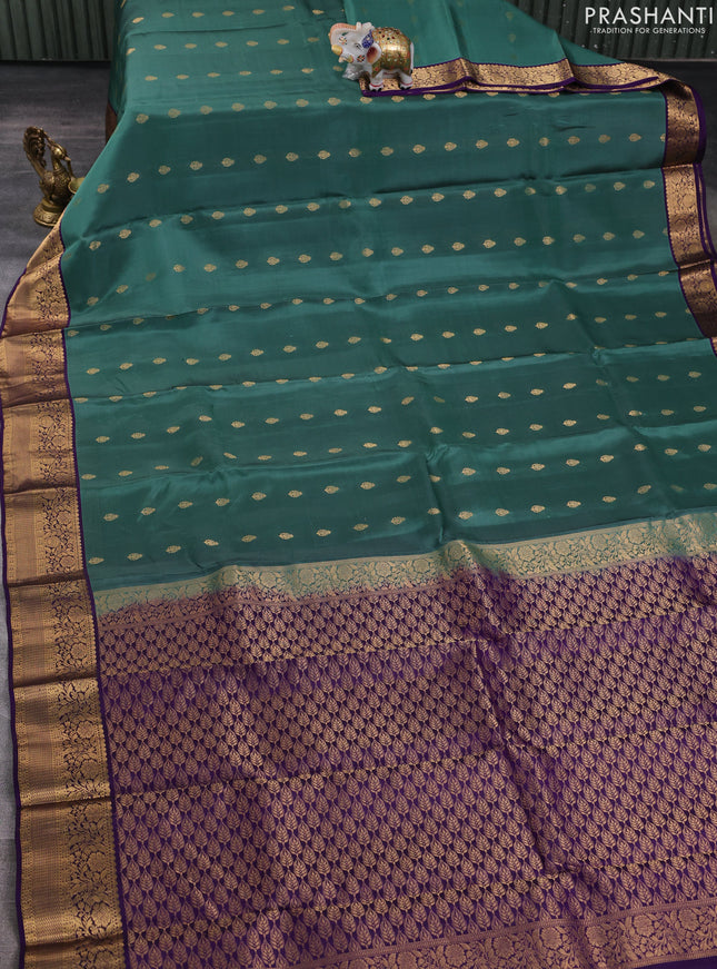 Kanchipuram silk saree pastel green and violet with allover zari woven buttas and zari woven border