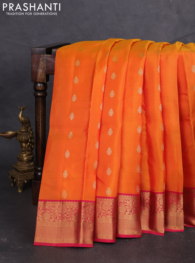 Kanchipuram silk saree orange and pink with allover zari woven buttas and zari woven border